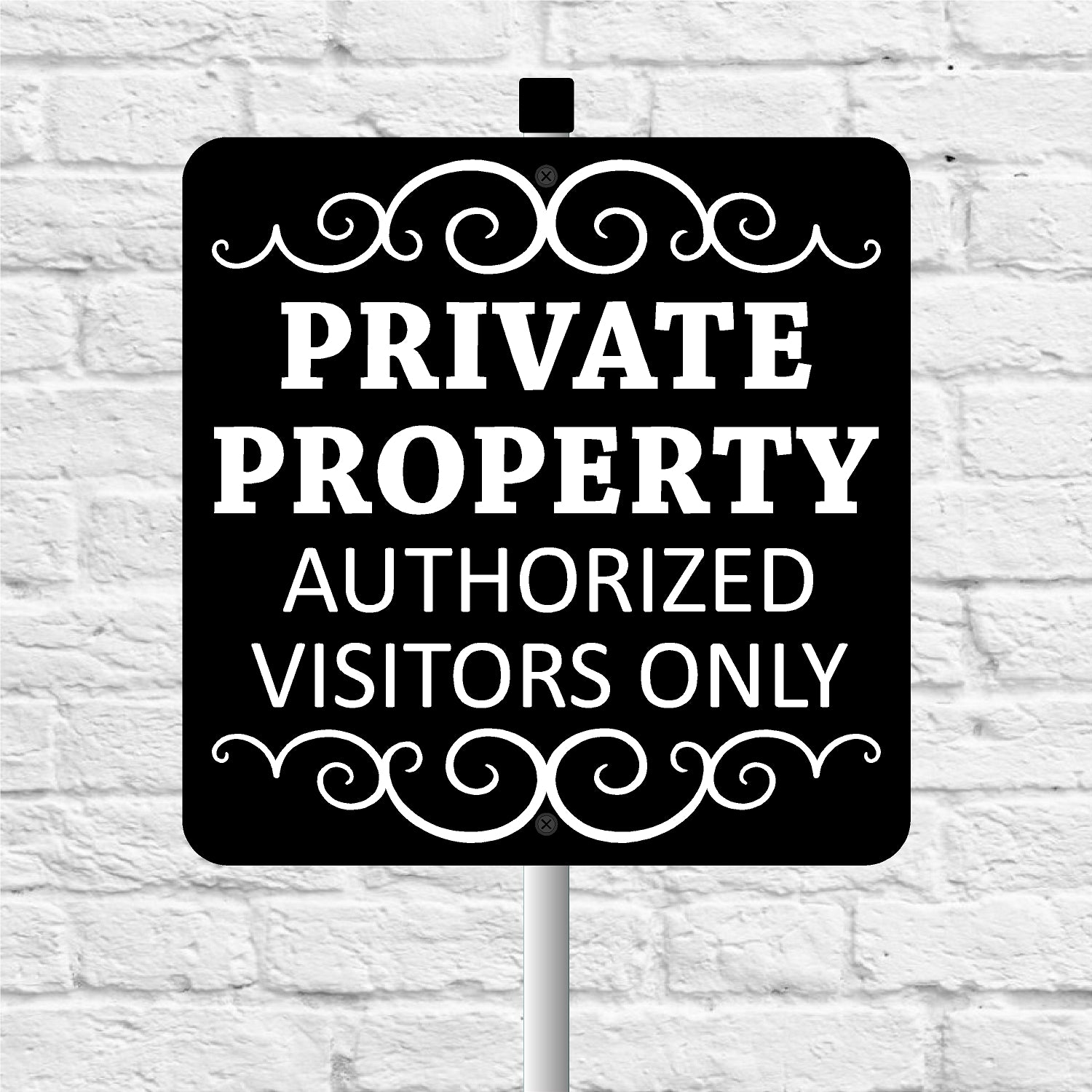 Black and white 'Private Property Authorized Visitors Only' sign on a white brick background
