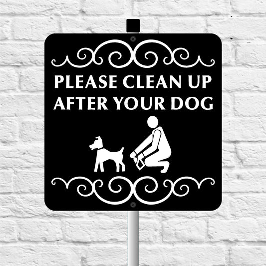 Sign with text 'Please clean up after your dog' on a white brick background