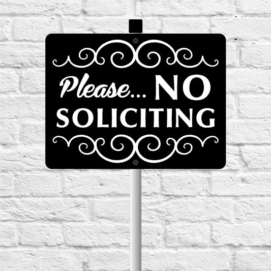 No soliciting sign with decorative elements on a white brick wall background
