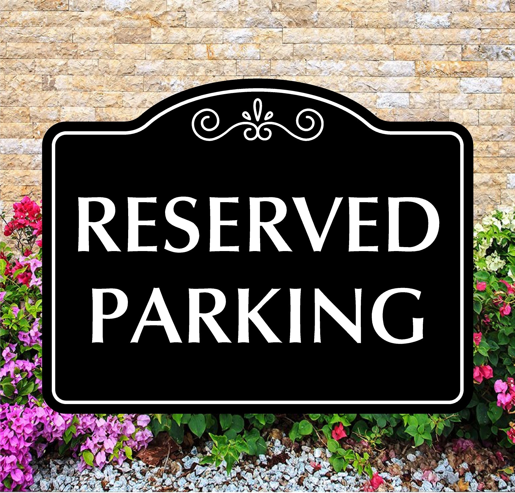Reserved parking sign with decorative elements on a stone wall background