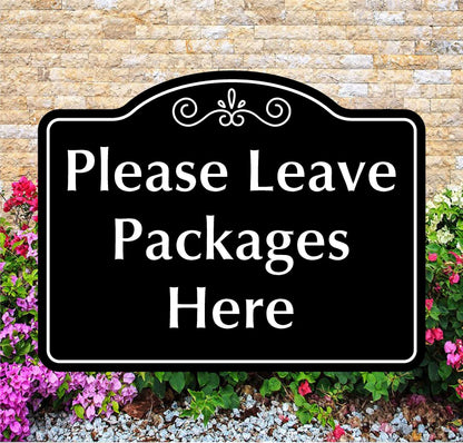 Decorative sign with 'Please Leave Packages Here' text in front of a brick wall and flowers.