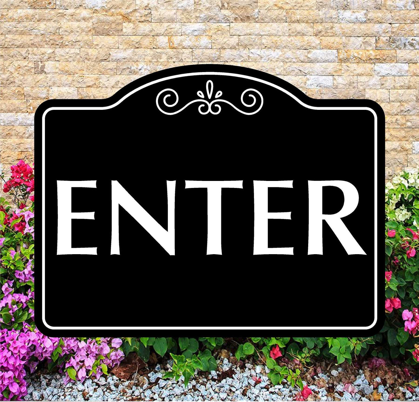 Decorative 'ENTER' sign with floral and stone background