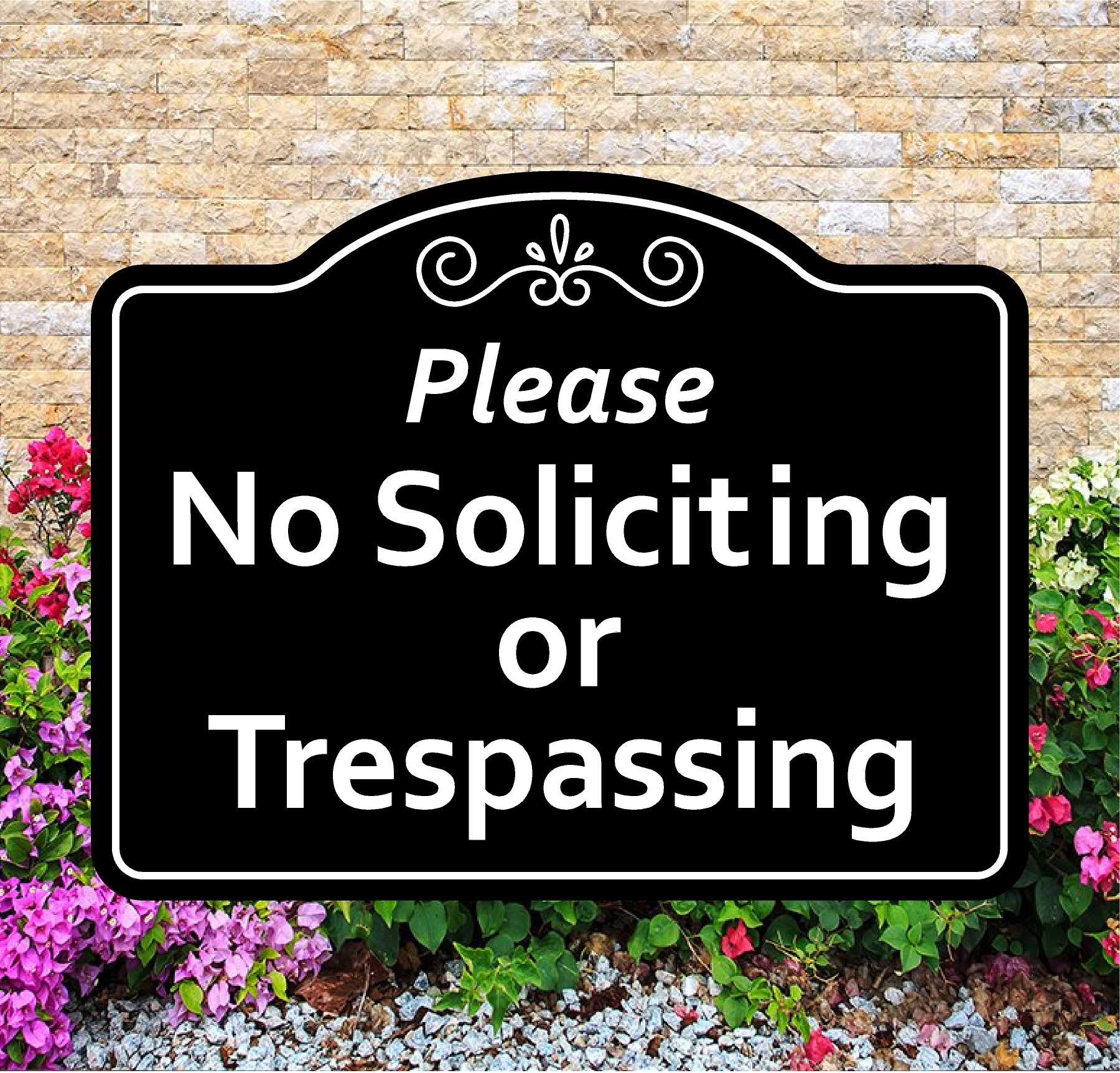 No Soliciting or Trespassing sign with decorative border on a stone wall background